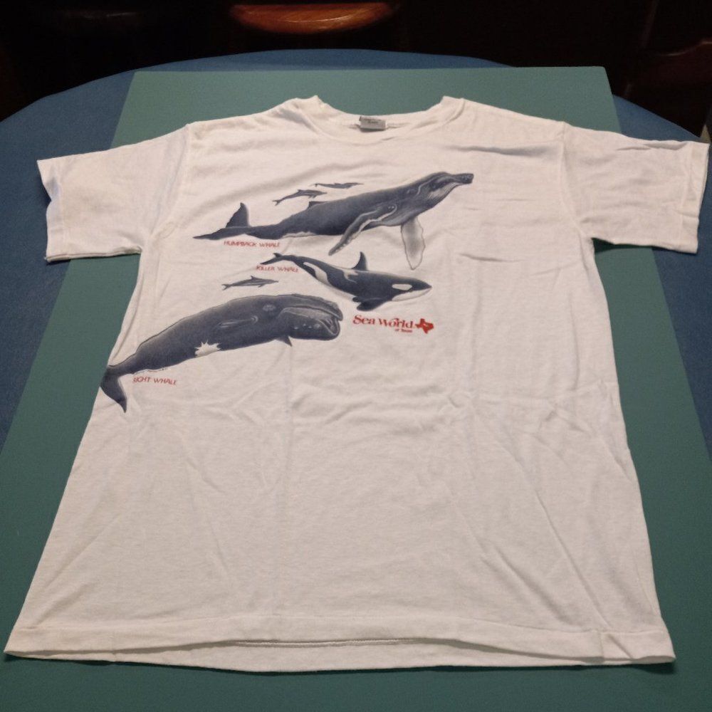 1987 F. Chaney-Harlequin, Platinum T's, Sea World, Wales graphic T-shirt